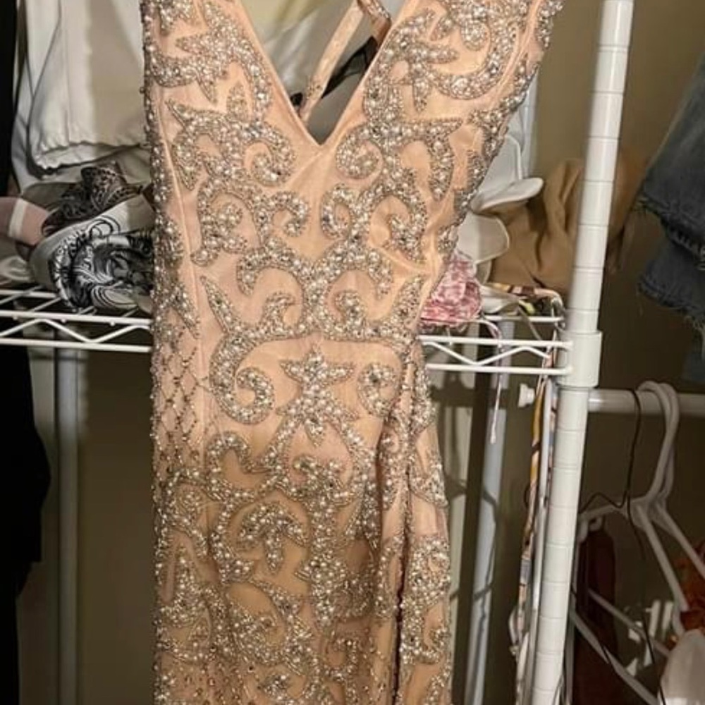 Perfect dress for HOCO or formal! Pink beautiful beaded.